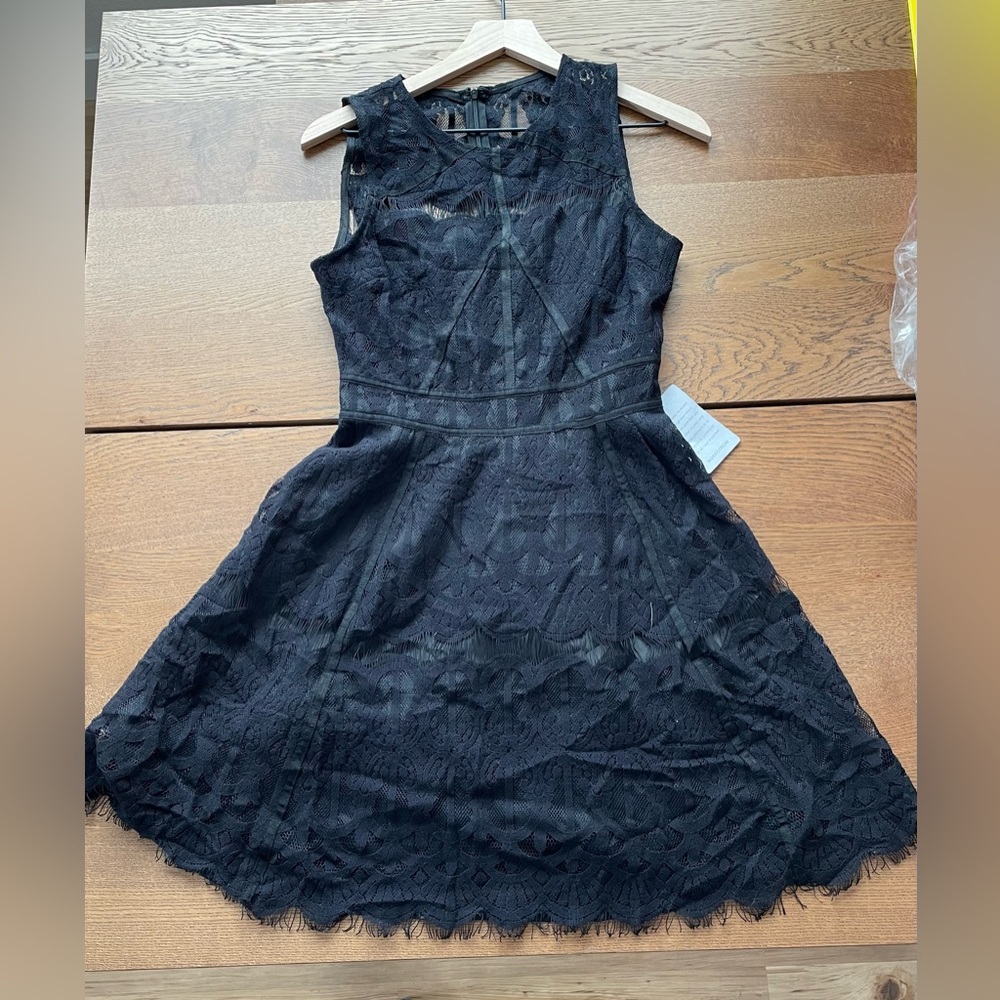 Adelyn Rea black lace knee length dress size small.  NWT
